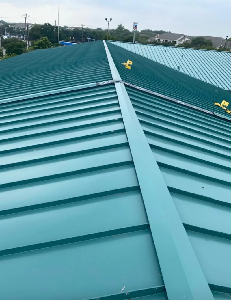 Green commercial metal roof ridge and valley for Metal Roof Repair in Pingree Grove